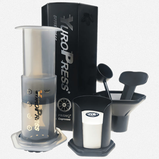 Xuropress coffee brewing device with packaging and accessories on a white background